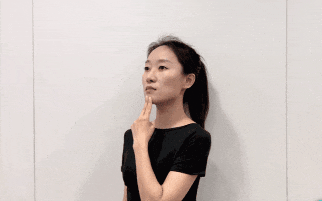 靠墙收下巴.gif